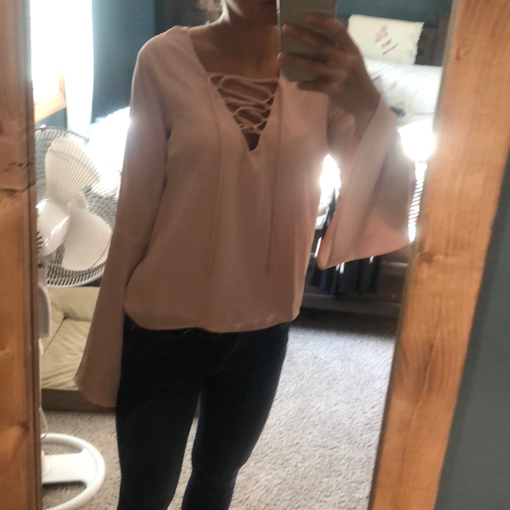 Lace up pink blouse